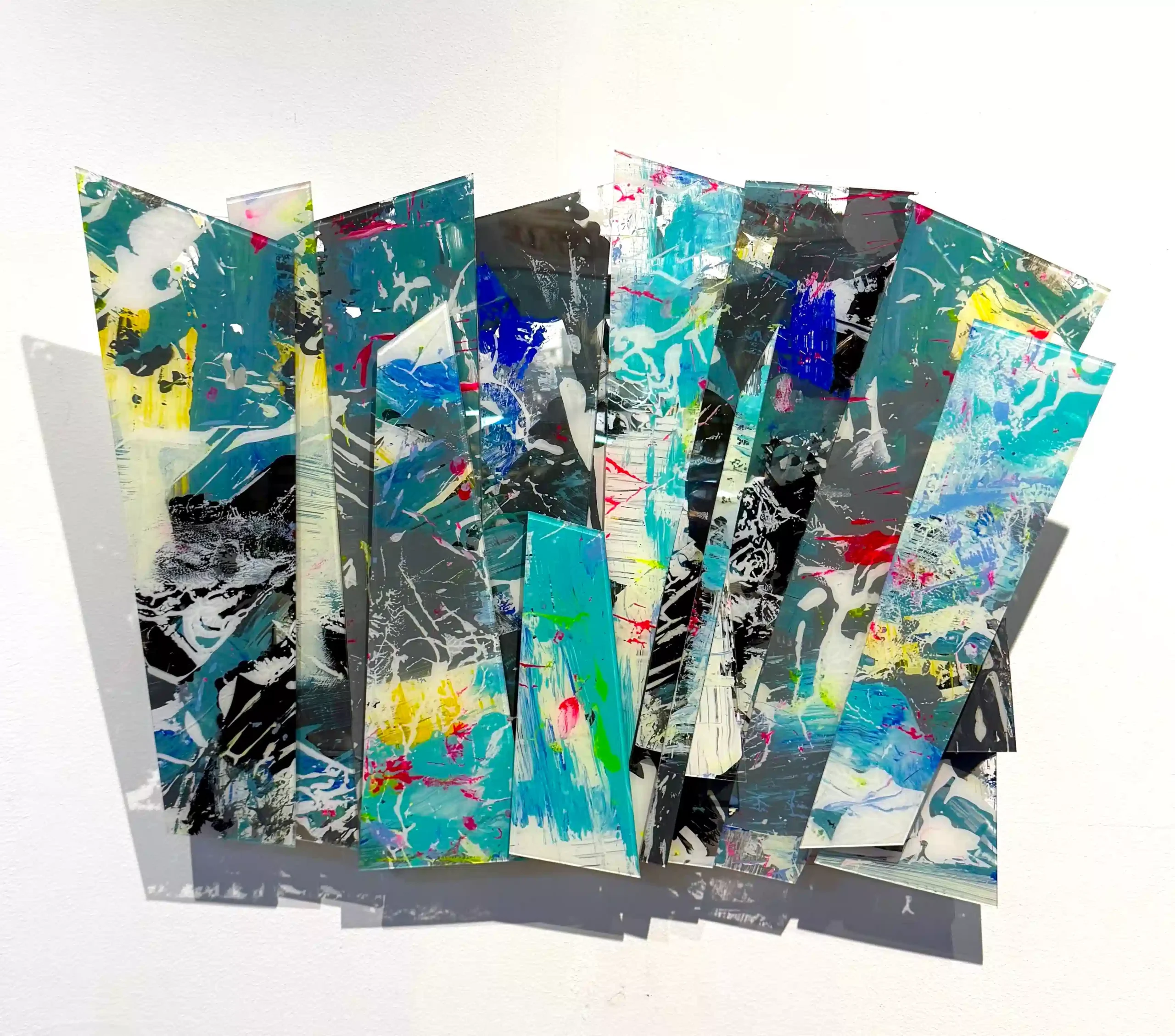 Hand painted acrylic on plexiglass sculpture by Marina Aristotel, Titled "Slices of rainbow". Features irregular organic edges and layered translucent volumes. Vibrant blue, yellow, pink shades with organic drawings. Premium dimensional wall art for modern luxury interior and boutique hotels.