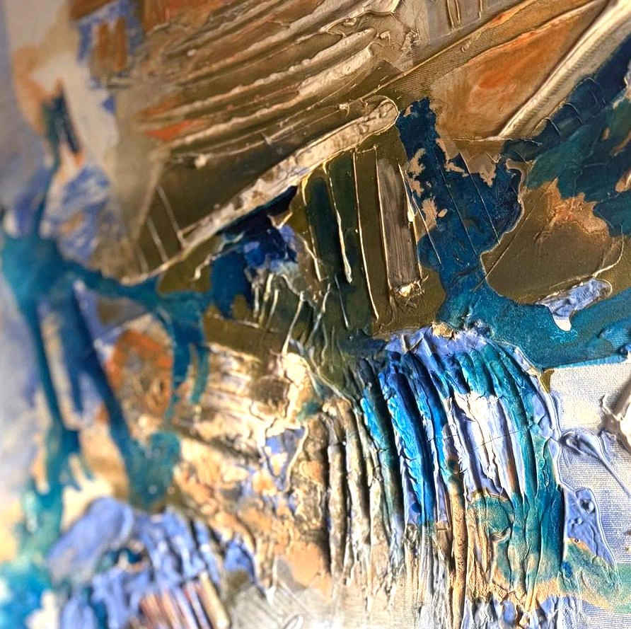 Call me blue by Marina Aristotel - Rectangular mixed-media sculptural painting from the AASAMBLAJ series. Features dense putty textures, acrylic insertions, and a high-contrast palette of blue, orange, brown, and white. Contemporary abstract wall art with tactile relief.